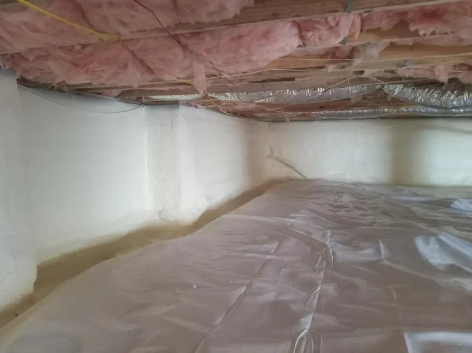 Crawl space encapsulation with closed-cell spray foam for Commercial Roof Restoration in Olean